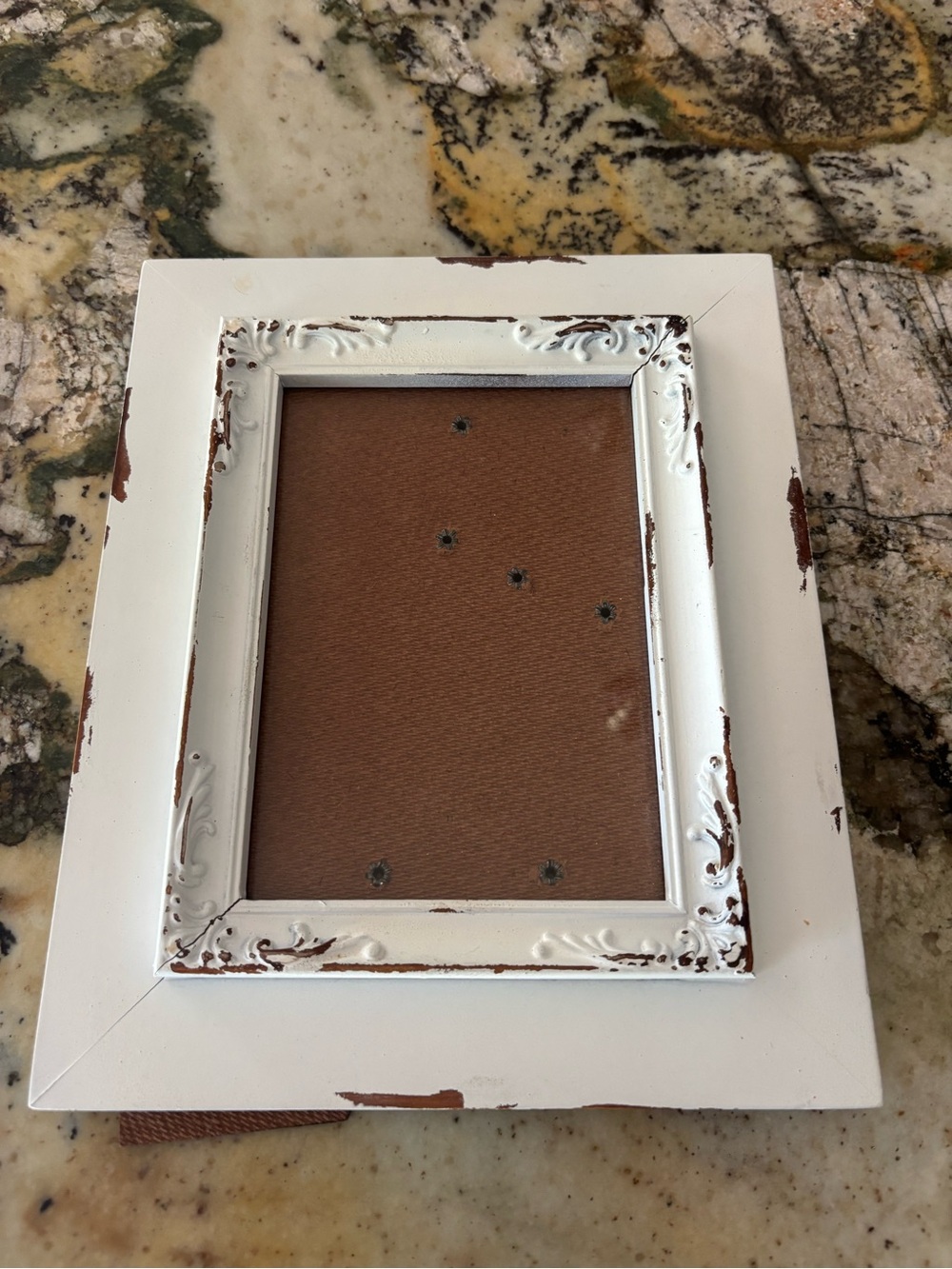 White distressed wooden farmhouse frame